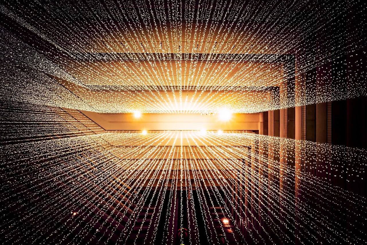Réseau de points lumineux convergents, image d'un système d'intelligence artificielle
